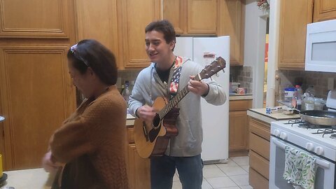 Richie plays guitar for his mom