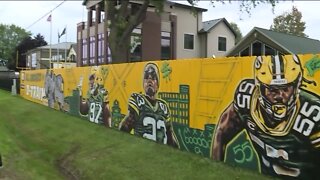 Local artist behind the Packers fence preparing for new season