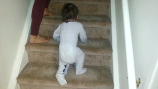 Baby demonstrates comically unique way of climbing stairs