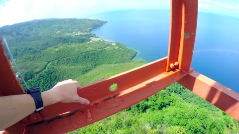 Crazy teen climbs radio tower in the Caribbean