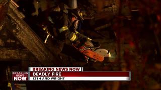 Firefighters on the scene of a house fire