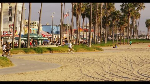 Riding Bikes and Jogging along California Beach Path