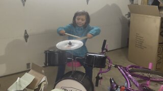 Trio of dummies playing drums