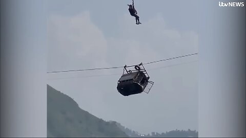 Pakistan: All eight people rescued from cable car stuck 900ft in the air | ITV News