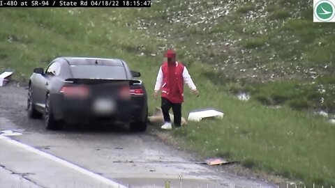 ODOT camera films litterbug dumping trash on highway in Cleveland
