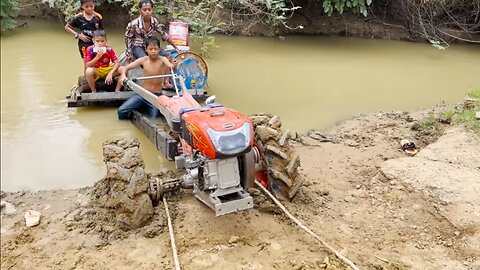 -driver tractor go transport water at the river