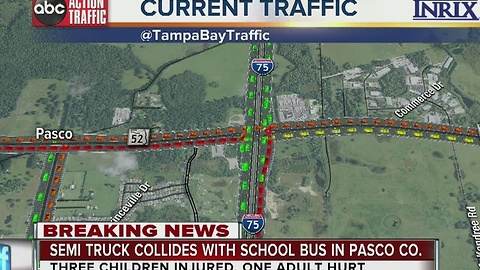 Semi truck collides with school bus in Pasco Co.