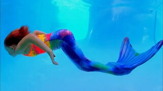 Mermaid Playing Underwater