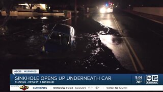 Sinkhole opens underneath car in Phoenix