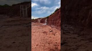 Mini waterfall on the beach