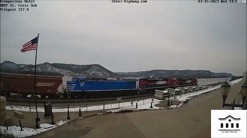 EB Grain with BNSF, FXE and CEFX power at Trempeateau, WI on March 15, 2023