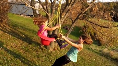 Creative dad builds epic bungee swing for daughters