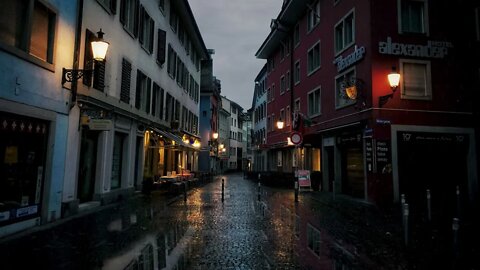 Evening rainfall on the cobblestoned Niederdorfstrasse outside Hotel Alexander in Zürich