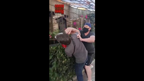 Man attacks peaceful Anti-Vaxxers