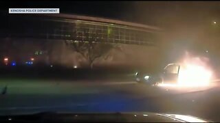 Kenosha officers rescue driver from burning minivan
