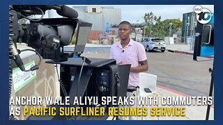 Wale Aliyu speaks with commuters as Pacific Surfliner resumes service