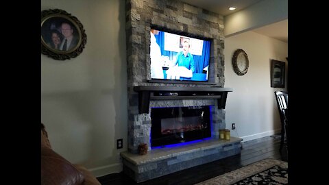 DIY - New Fireplace and T.V. in the Family-room build. Airstone from Lowe's TV is Samsung.