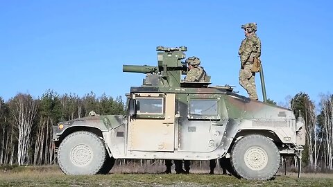 Firing a TOW missile system from a Humvee God Bless America