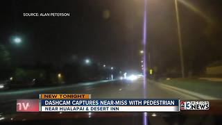 Dash-cam captures near-pedestrian miss on video