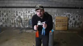 Artist plays song using bottles