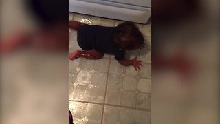 Funny Baby Boy Slides In Oil