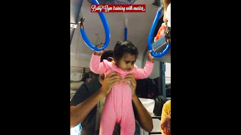 Funny baby gymnastics in train
