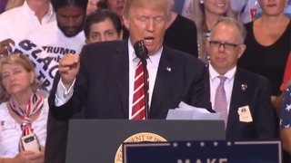 RAW: Crowd shouts "U-S-A" at Trump speech protester