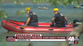 2 people pulled from river, divers search for other possible victims