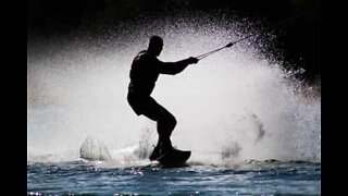 Wakeboarder imitates jumping dolphin
