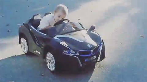 3 Year old does donuts in his BMW