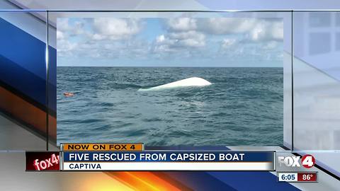 Boaters rescued from capsized boat