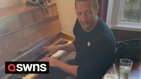 Chris Martin makes a surprise appearance singing a Coldplay classic to an engaged couple