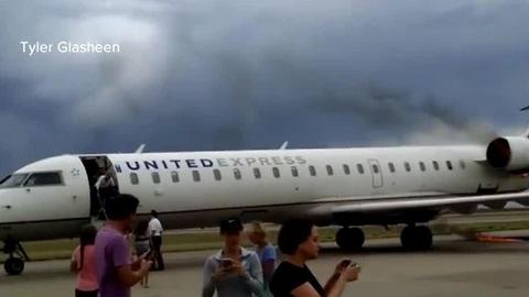 Plane engine catches fire during landing