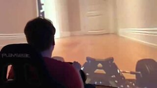 Man "sits" behind the wheel of remote control car