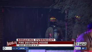 House catches fire near H Street and Owens