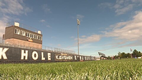 Kuna High School football player signs National Anthem at game