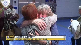 Sisters meet for the first time at Detroit Metro Airport