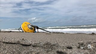 Massive desalination buoy washes up on Hobe Sound beach