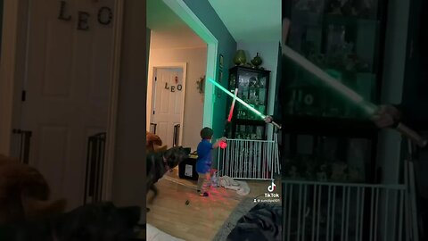 little Leo playing with his very own lightsaber part train?! 😂💫#starwars #lightsaber #green #cute