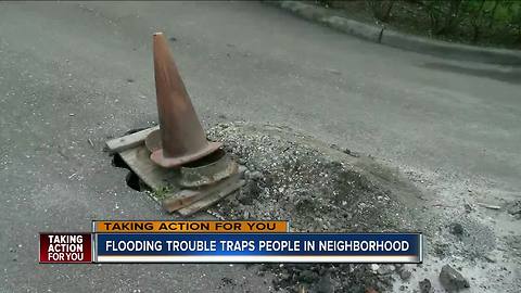 Residents say rain and potholes leave them trapped