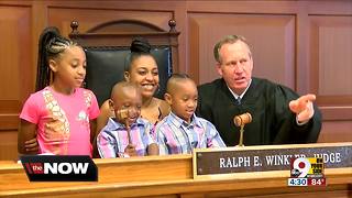 Woman adopts former foster sons