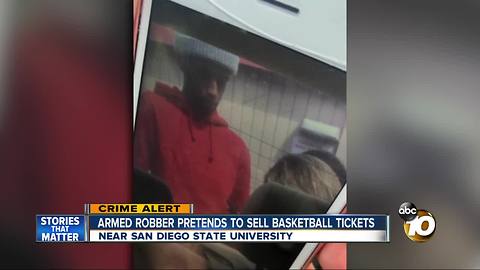 Armed robber pretends to sell basketball tickets