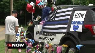 Mentor rallies around police department