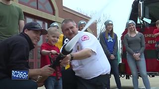Boy battling cancer becomes firefighter for a day