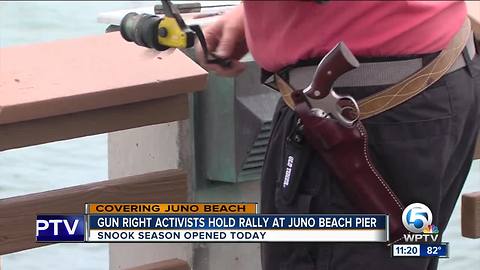 Gun rights activists hold rally at Juno Beach pier