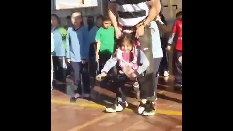 Gym teacher helps a disabled girl to dance with her classmates. Just look at her smile! 😊💜
