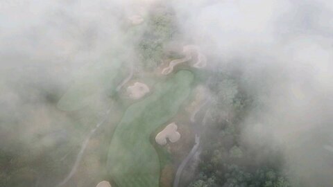DJ I Pro drone flight over a golf course