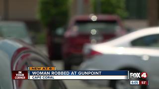 Woman robbed at gunpoint by Winn-Dixie parking lot