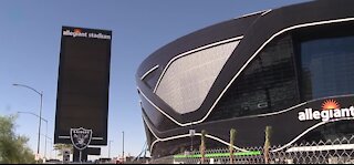 Raiders fans watching the game from TVs in stadium parking lot