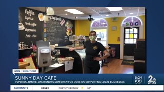 Sunny Day Cafe says "We're Open Baltimore!"